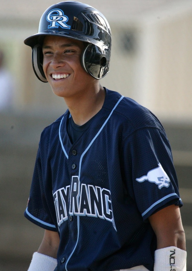 Austin playing baseball